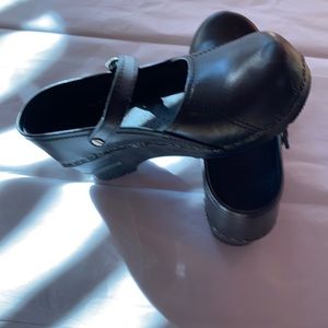 Ladies black leather Sanita Mary Jane Clogs. Used see pics for wear on one heel